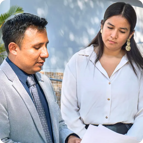 An Abuse Counseling & Therapy counselor reviews documents with a client.