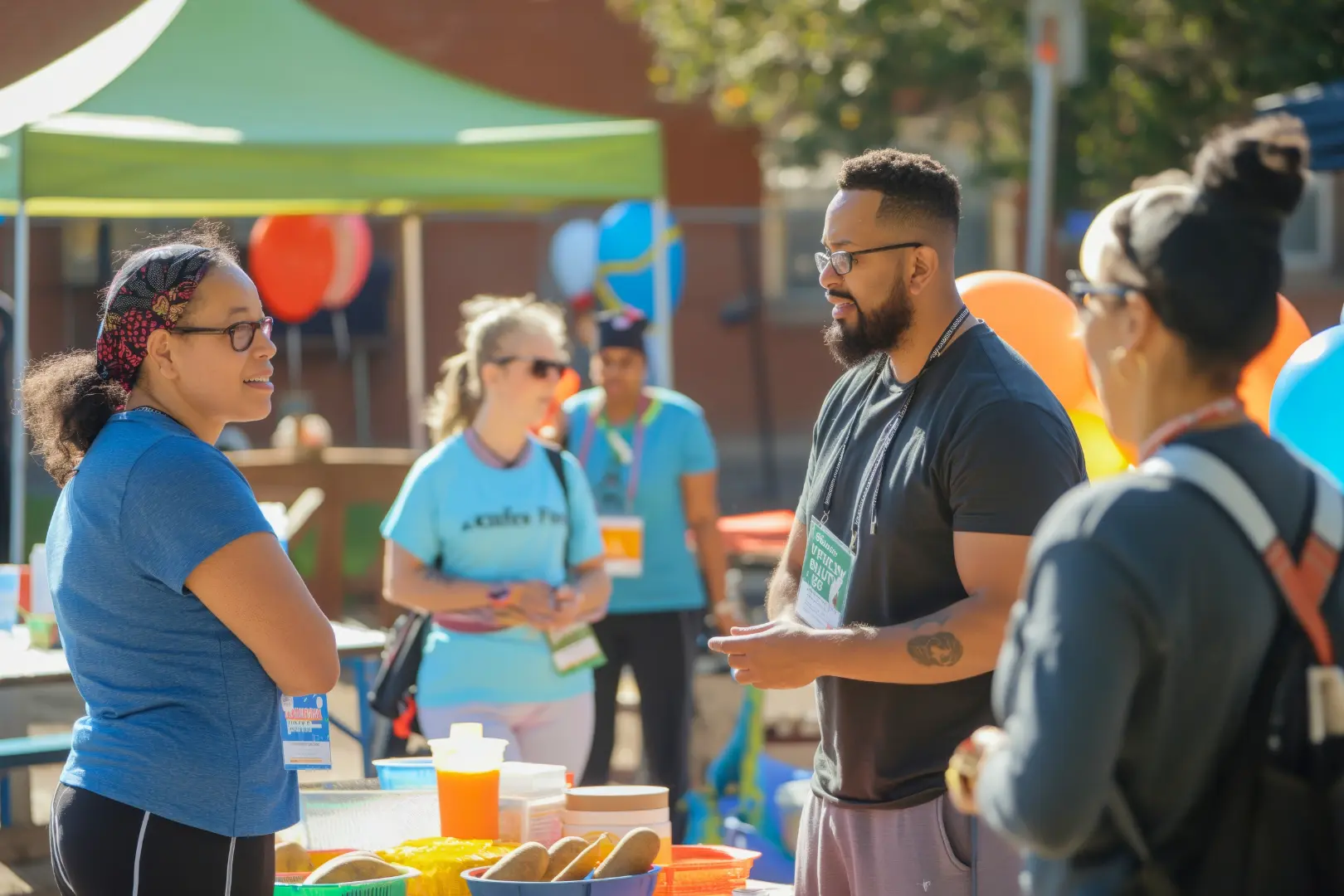 Abuse Counseling & Therapy staff connect with community members at an outdoor outreach event.