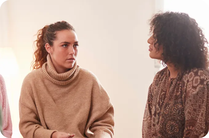 A woman speaks during a supportive group therapy session at Abuse Counseling & Therapy.