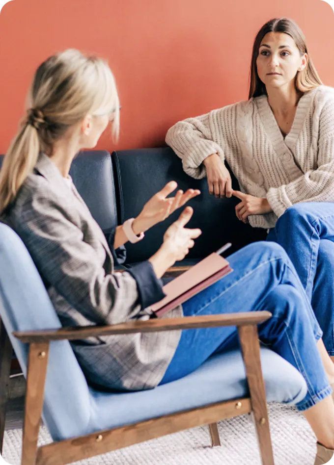 An Abuse Counseling & Therapy counselor speaks with a client during a supportive session.