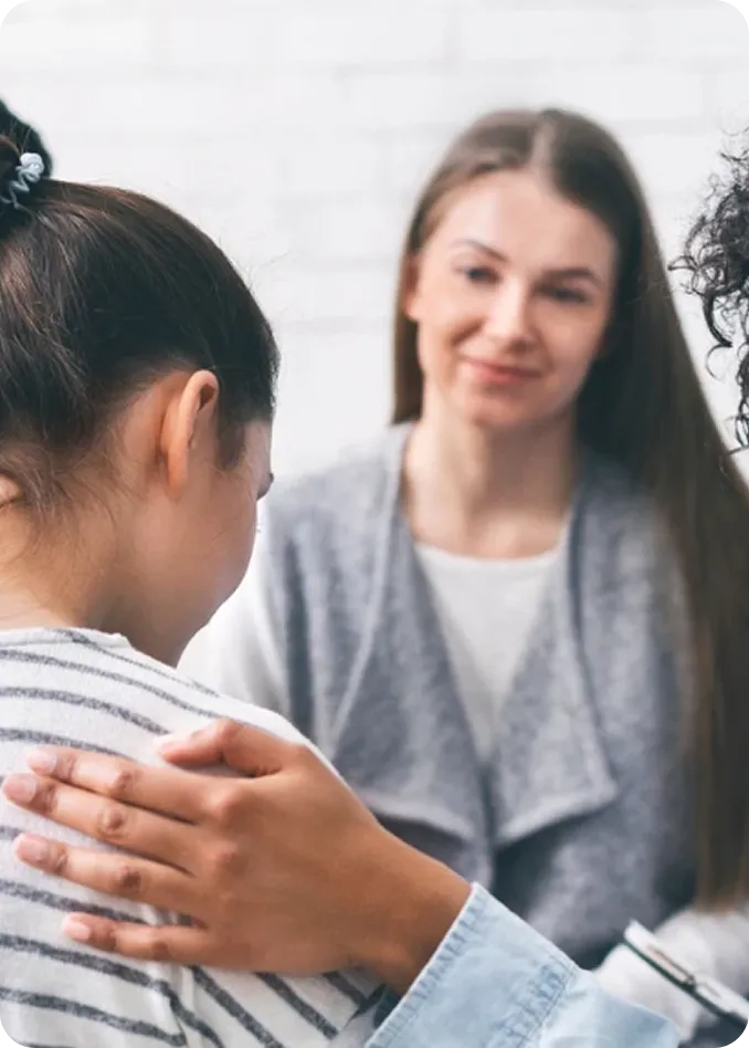 A woman receives compassionate support during a therapy session at Abuse Counseling & Therapy.