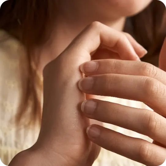 A close-up of a survivor's hands, symbolizing healing and support from Abuse Counseling & Therapy.